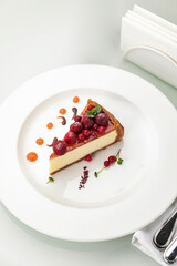 Desserts on a white plate and a white background
