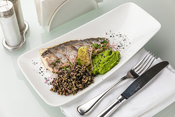 sea ​​bream grill on a plate
