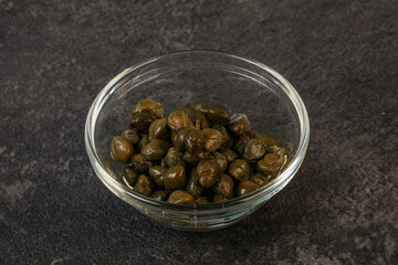 Tasty capers in the bowl