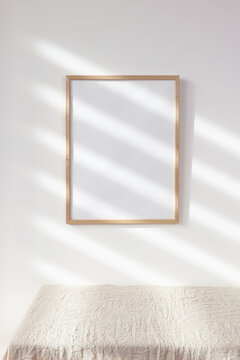 Wood photo frame mockup on white wall