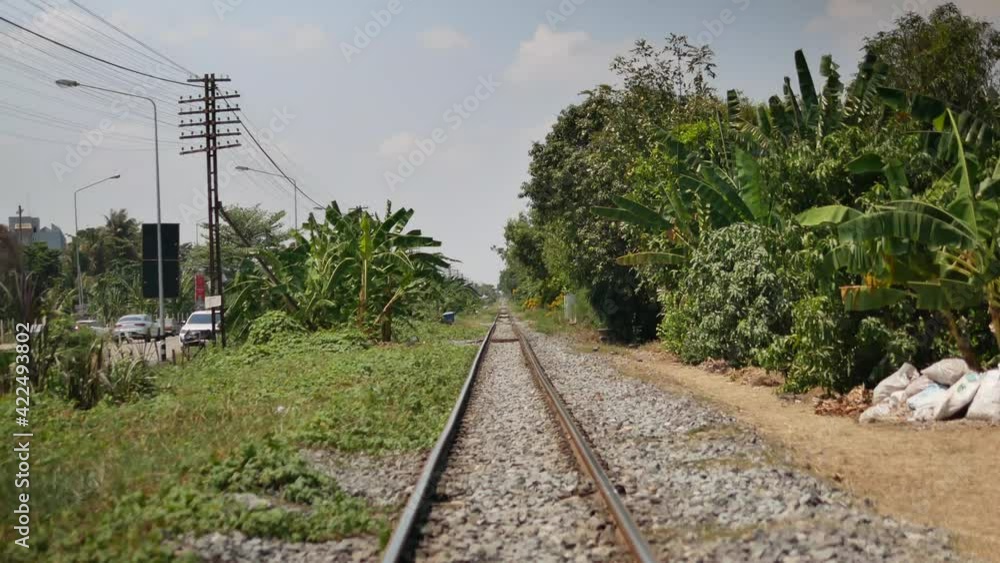Aufkleber empty local railway surrounded by trees and grass