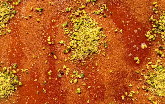 Traditional eastern dessert kunafa. Top view of arabic mixed cheese kunafa background. Konafa background
