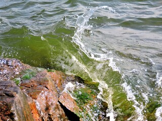 water flowing into the rocks