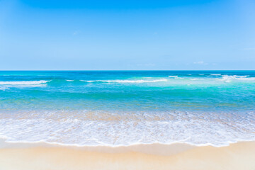 Beautiful tropical beach sea ocean with white cloud and blue sky
