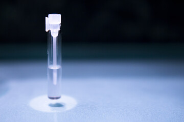 Glass bottle with perfume sample