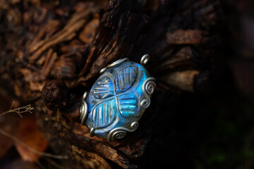 Blue labradorite pendant on natural background