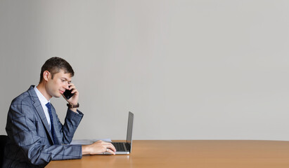 A business man looking at his computer