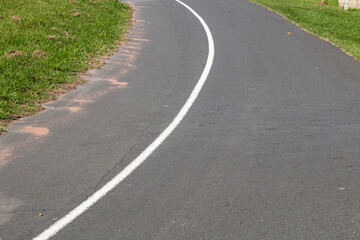 Solid White Line Running Down Centre of Tarred Road