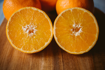 Ripe oranges on wooden background. organic orange fruit.	
