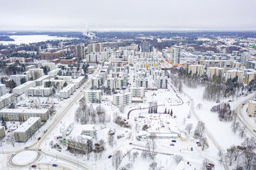 Aerial view of Matinkyla neighborhood of Espoo, Finland. Snow-covered city in winter.