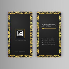 Golden mandala with business card on dark background