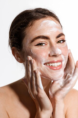 Beauty woman using cleansing foam for fresh and hydrated skincare routine, treating face from acne...