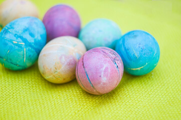 Watercolor background with colorful rainbow Easter eggs.