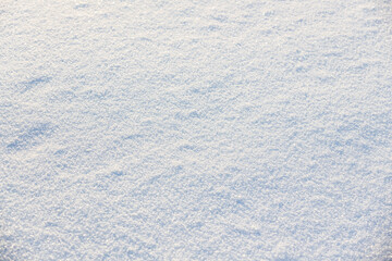 Fresh snowdrift surface on a sunny day