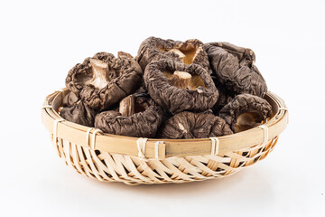 A lot of dried shiitake mushrooms in basket