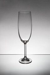 Empty glass for wine or champagne on a white background for advertising and ilustrational purpose