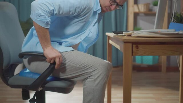 freelancer or office worker puts a seat Cushion Pillow for Office Chair