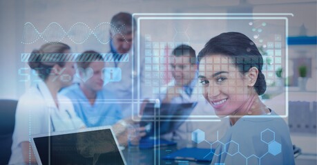 Digital interface with medical data processing against portrait of female health worker