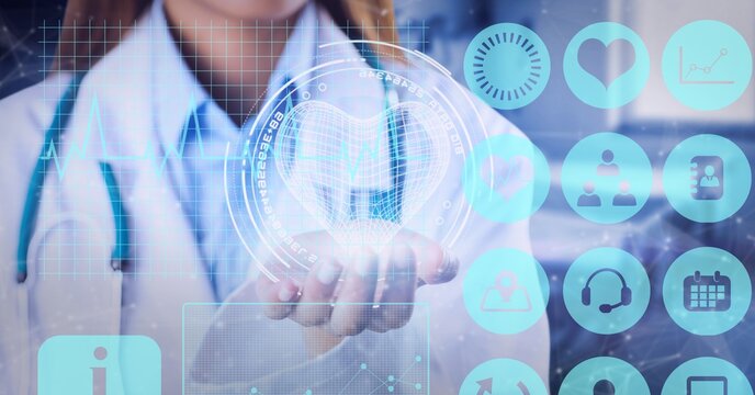 Digital interface with medical data processing over mid section of female doctor with cupped hand