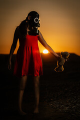 Girl in Red Dress Holding a Teddy Bear