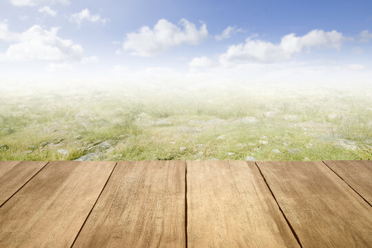 Wooden table with meadow view