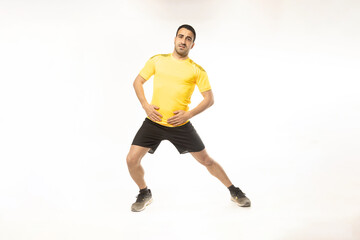 Fototapeta na wymiar athlete man stretching exercises on white background.