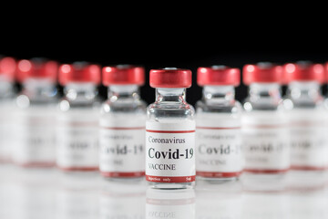 Covid-19 coronavirus vaccine vials close-up