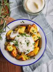 Roasted potatoes with white garlic sauce