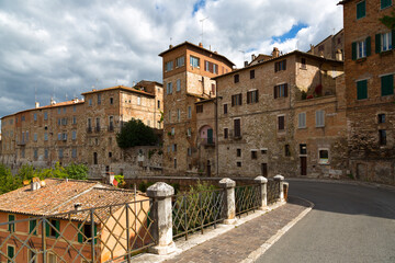 Fototapeta na wymiar street with old stone houses in Perugia, Umbria, Italy