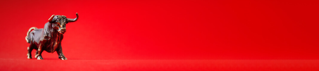 Red banner with generic bull figurine