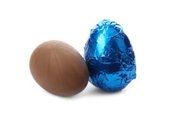 Two sweet chocolate eggs on white background