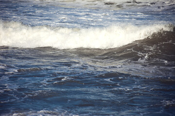 Fototapeta premium Sea waves and foam of Mediterranean sea with strong wind, Spain,