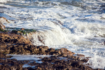 Sea waves and foam of Mediterranean sea with strong wind, Spain,