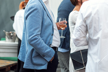 Obraz premium People enjoying drinks at the outdoor party. Luxury event, body parts.