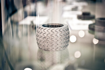 Selective Laser Melting. Object printed on metal 3d printer close-up.