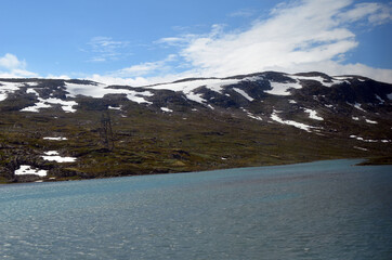 Views from the train window. Mountain tundra of Central Norway. Railway travel in Norway.The Bergen - Oslo train.