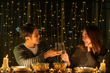 Young asian couple celebration Christmas night party and Happy new year 2021