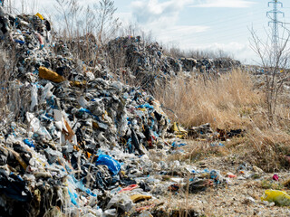 Illegal plastic dump. The toxic plastic exported from Germany is collected in empty quarries of Poland and is not recycled.