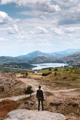Fototapeta premium Photographer Standing And Enjoying On Nature View