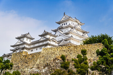 Naklejka premium View of Himeji Castle in Kansai, Japan, considered as Japan's most spectacular castle and popular tourist destination. The place is one of the UNESCO World Heritage Site.