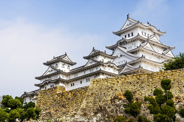 Fototapeta premium View of Himeji Castle in Kansai, Japan, considered as Japan's most spectacular castle and popular tourist destination. The place is one of the UNESCO World Heritage Site. 
