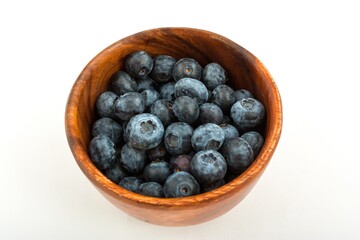 Blueberries in a wooden bowl