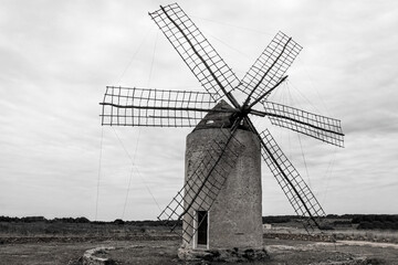 Fototapeta na wymiar windmill in the countryside of Formentera