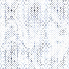 Geometric repeat pattern with distressed texture and color

