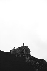 silhouette of a person in the mountain