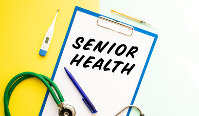 SENIOR HEALTH text on a letterhead in a medical folder on a beautiful background.