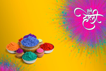Indian festival Holi concept Multi color's bowl with colorful background and writing happy holi in marathi calligraphy.