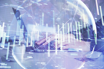 Multi exposure of woman hands typing on computer and business theme hologram drawing. Success...