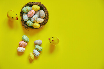 Easter eggs on yellow background. Happy Easter. Holiday concept.