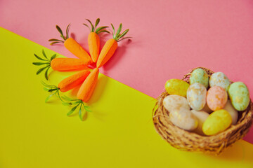 Easter eggs on the yellow -pink background. Happy Easter. Holiday concept.